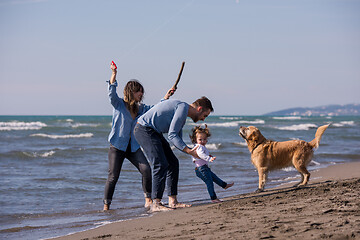 Image showing happy young family enjoying vecation during autumn day