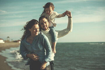 Image showing Young family enjoying vecation during autumn