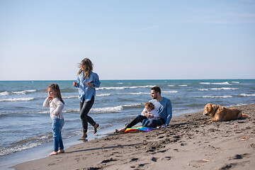 Image showing happy young family enjoying vecation during autumn day