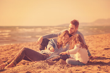 Image showing Young family enjoying vecation during autumn