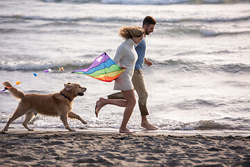 Image showing happy couple enjoying time together at beach