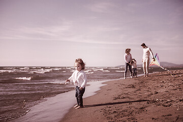 Image showing happy family enjoying vecation during autumn day