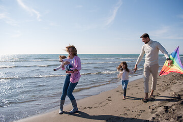 Image showing happy family enjoying vecation during autumn day