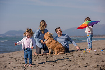 Image showing happy young family enjoying vecation during autumn day