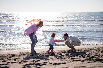 Image showing happy family enjoying vecation during autumn day