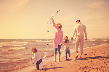 Image showing happy family enjoying vecation during autumn day