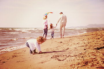 Image showing happy family enjoying vecation during autumn day