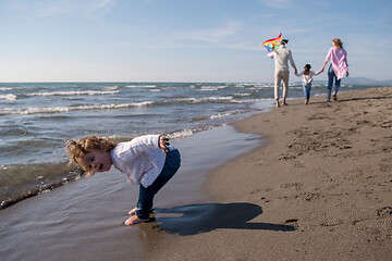 Image showing happy family enjoying vecation during autumn day