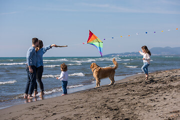 Image showing happy young family enjoying vecation during autumn day