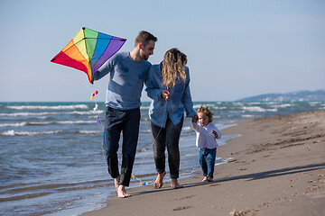 Image showing happy family enjoying vecation during autumn day