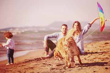 Image showing happy young family enjoying vecation during autumn day