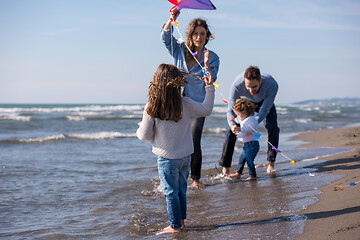 Image showing happy family enjoying vecation during autumn day