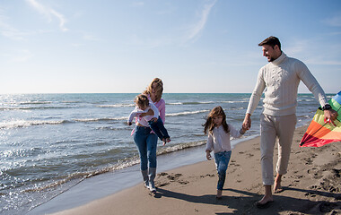 Image showing happy family enjoying vecation during autumn day