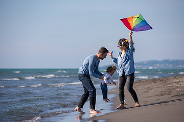 Image showing happy family enjoying vecation during autumn day