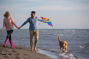 Image showing happy couple enjoying time together at beach