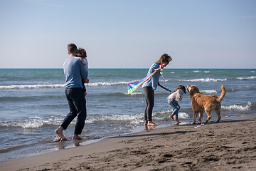 Image showing happy young family enjoying vecation during autumn day