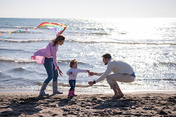 Image showing happy family enjoying vecation during autumn day