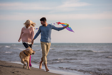 Image showing happy couple enjoying time together at beach