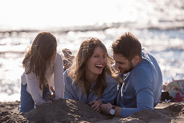 Image showing Young family enjoying vecation during autumn