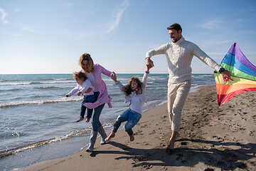 Image showing happy family enjoying vecation during autumn day