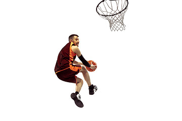 Image showing Full length portrait of a basketball player with ball