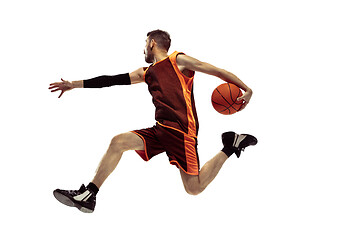 Image showing Full length portrait of a basketball player with ball