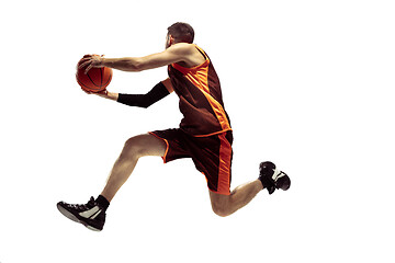 Image showing Full length portrait of a basketball player with ball