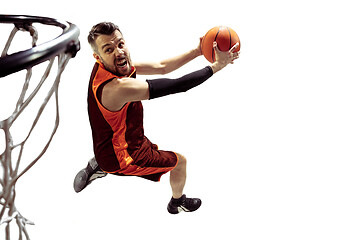 Image showing Full length portrait of a basketball player with ball