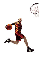 Image showing Full length portrait of a basketball player with ball