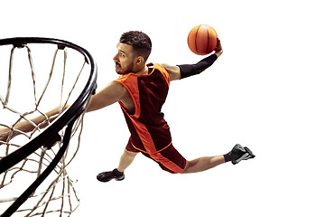 Image showing Full length portrait of a basketball player with ball