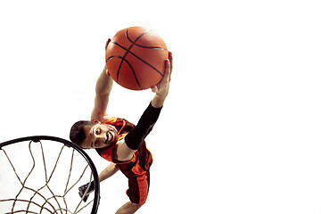 Image showing Full length portrait of a basketball player with ball