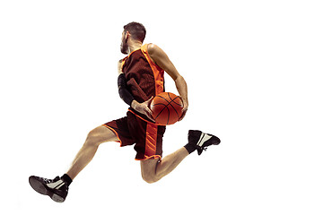 Image showing Full length portrait of a basketball player with ball