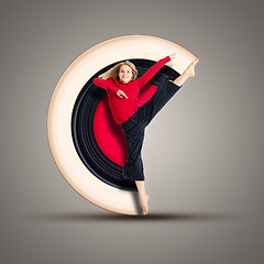 Image showing female dancer in action with circular motion background