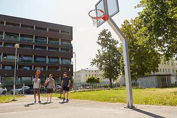 Image showing group of male friends going to play basketball