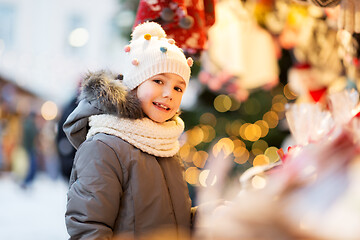 Image showing happy little girl at christmas market in winter