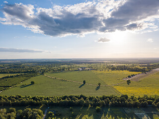 Image showing Panoramic aerial view from a drone above the countryside area on a sunny cloudy day.