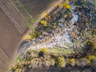 Image showing Top areal view from drone above trash and garbage dump.