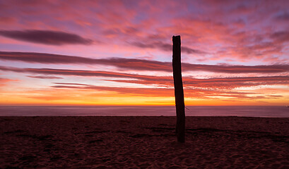 Image showing Amazing vivid sunrise over the ocean from the beach