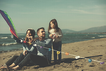 Image showing happy family enjoying vecation during autumn day