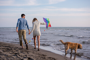 Image showing happy couple enjoying time together at beach