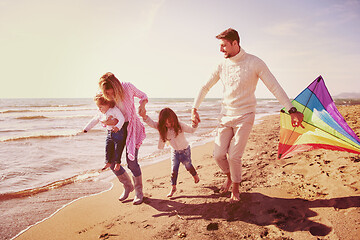 Image showing happy family enjoying vecation during autumn day