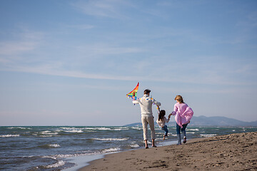 Image showing happy family enjoying vecation during autumn day