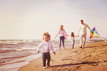 Image showing happy family enjoying vecation during autumn day