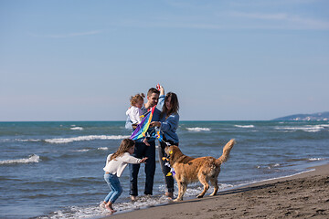 Image showing happy young family enjoying vecation during autumn day