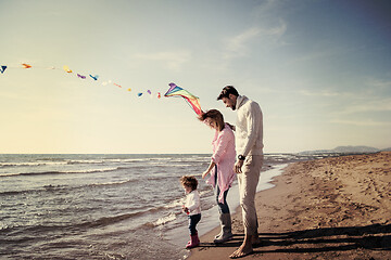 Image showing happy family enjoying vecation during autumn day