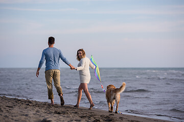 Image showing happy couple enjoying time together at beach