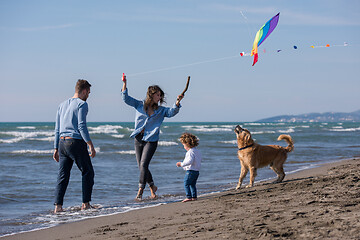 Image showing happy young family enjoying vecation during autumn day