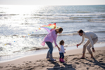 Image showing happy family enjoying vecation during autumn day