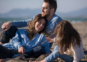 Image showing Young family enjoying vecation during autumn