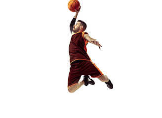 Image showing Full length portrait of a basketball player with ball